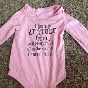 A baby girl, one piece great for the winter